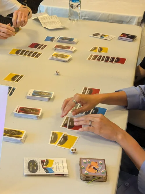 People playing and testing games at a WAGIC community event